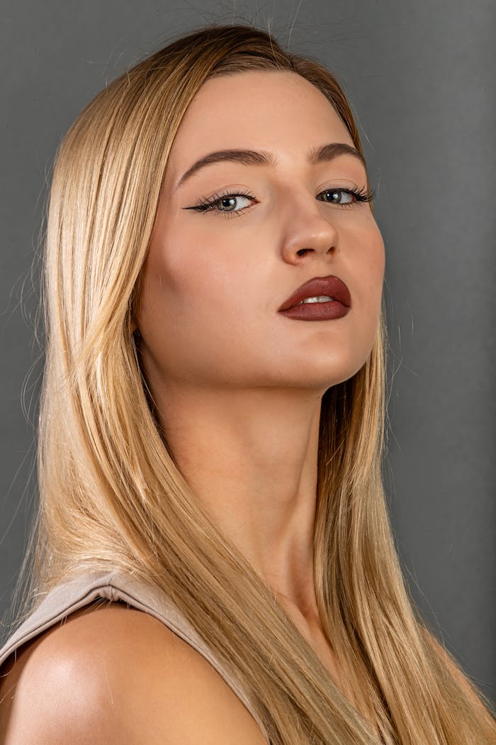 Close-up of a stylish woman posing in a studio photoshoot, İstanbul.